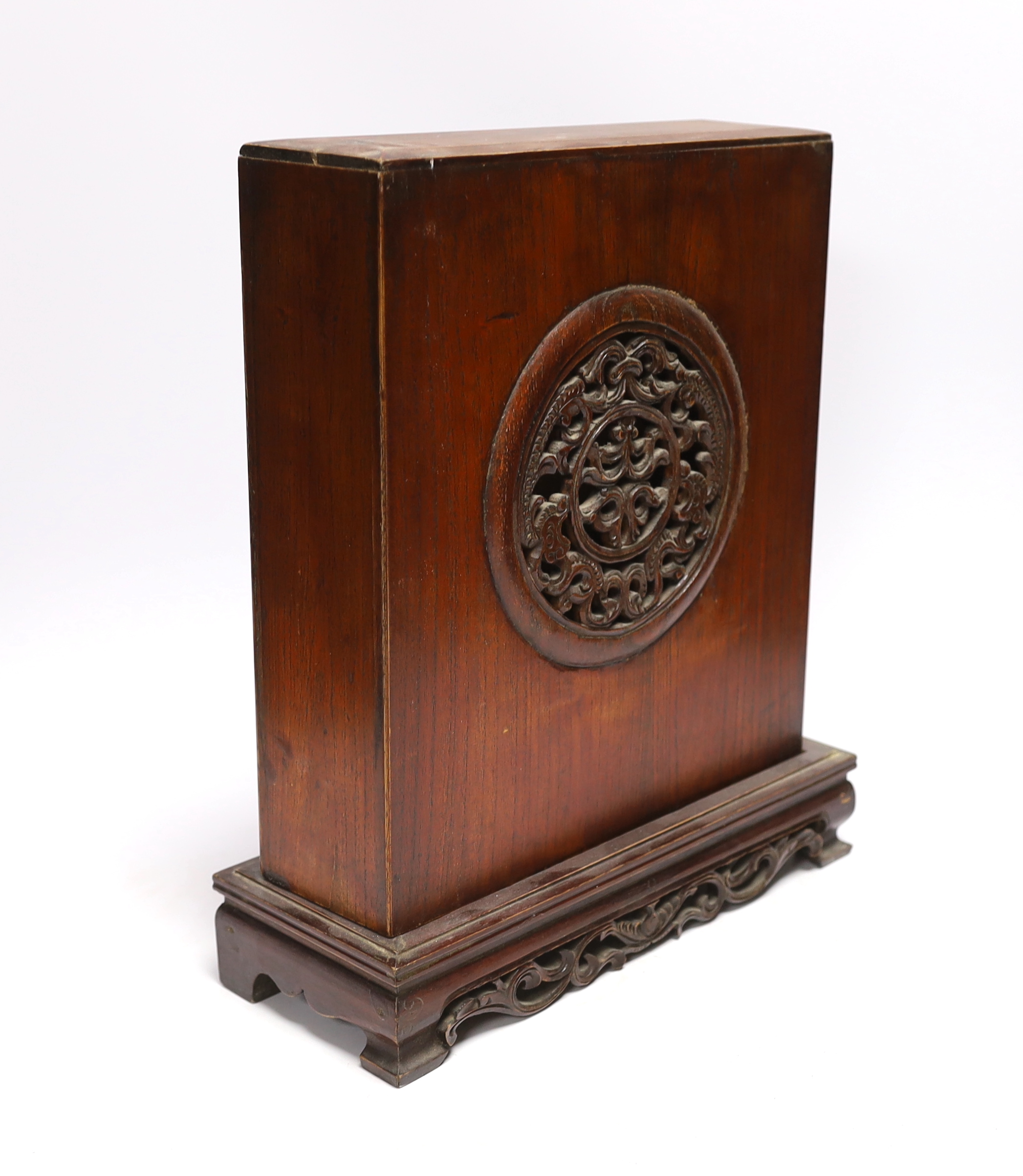 A Buddhist domestic carved hardwood shrine, 34cm high